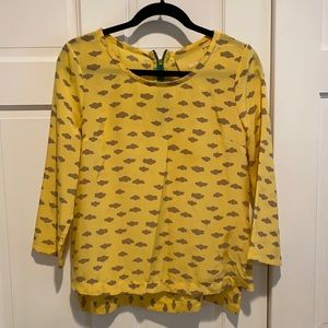 Yellow silk blouse with grey clouds